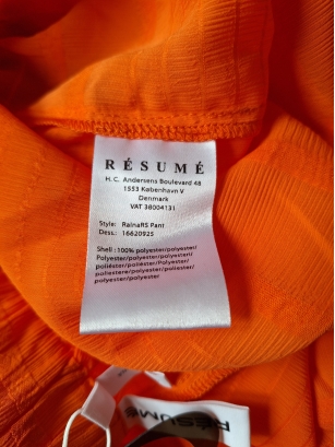 Pomarańczowe spodnie M Resume