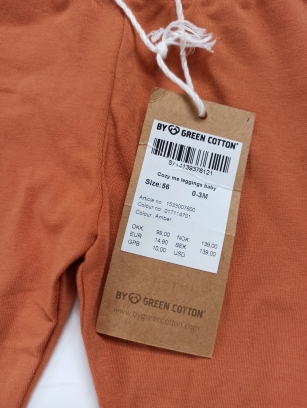 Pomarańczowe legginsy Musli
